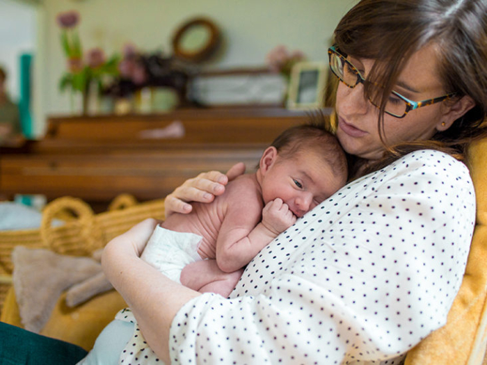 Mother-holding-newborn-baby-in-nursery-732x549-thumbanil-732x549.jpg